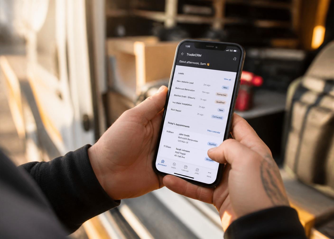 Business owner using CRM on phone
